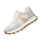 Cream cow suede height increasing sneaker, angled side view with the gum sole