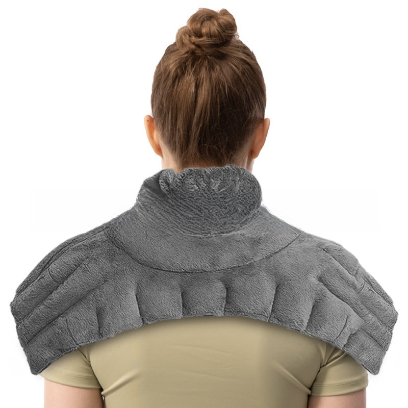 Back view of a woman wearing the gray plush neck and shoulder wrap with stand-up collar