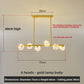 Gold pendant light with six starry glass shades and a 5 W LED string, 75 cm across and 60 cm high, 3-color LED option