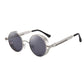 Round metal sunglasses with coiled spring temple arms and small side shields