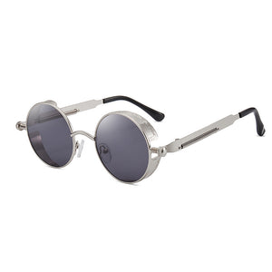 Round metal sunglasses with coiled spring temple arms and small side shields