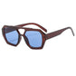 Retro polygonal sunglasses in soft natural light showing the tinted lenses