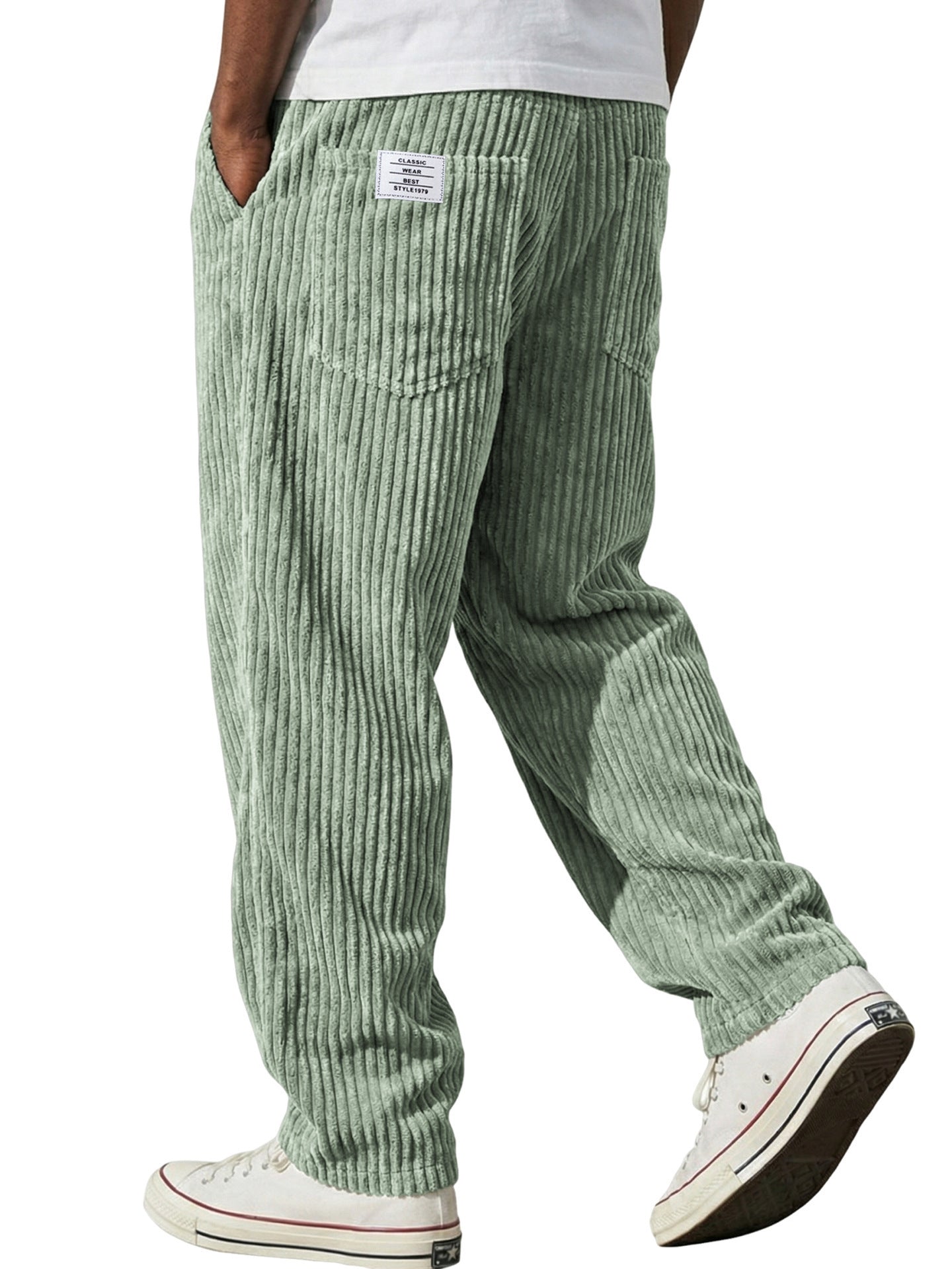 Full length front view of the wide wale corduroy trousers in a solid color