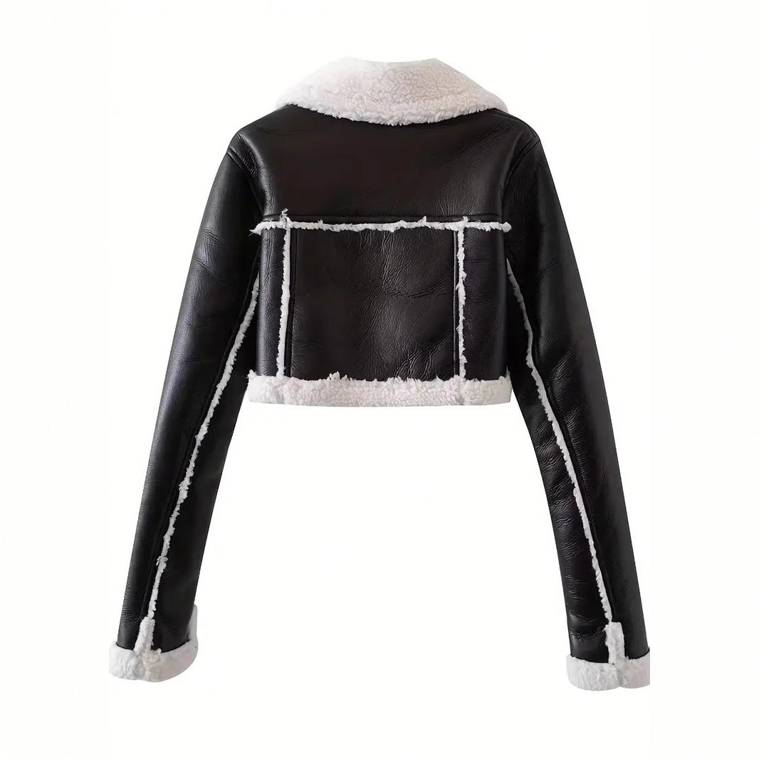 Cropped black vegan leather jacket with sherpa collar shown on the body over dark jeans