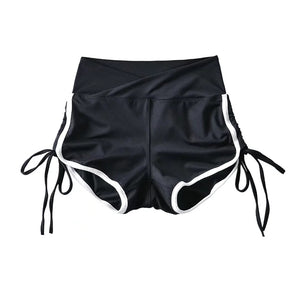Side profile of high waist shorts showing the contrast trim line