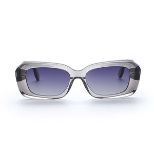 Transparent gray retro square frame sunglasses with blue gradient lenses shown from the front
