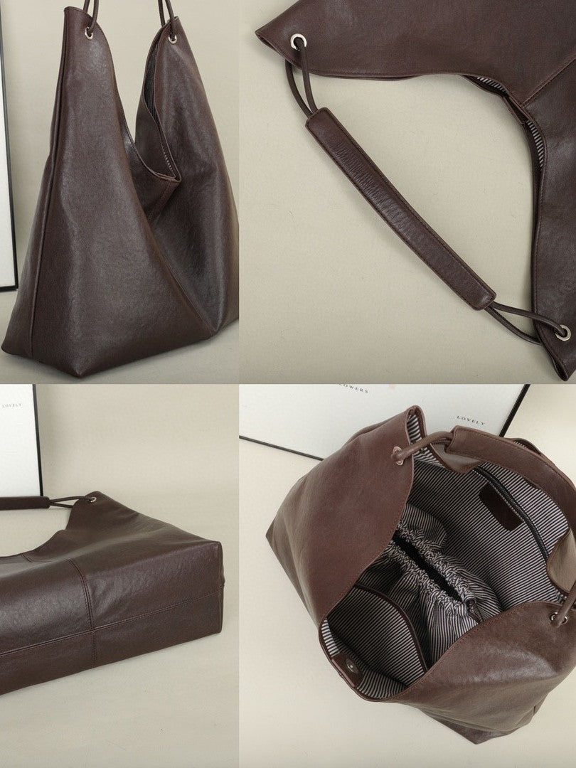 Leather tote interior showing polyester lining and pockets
