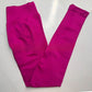 Berry seamless leggings with the curved knitted seat panel visible on the flat lay