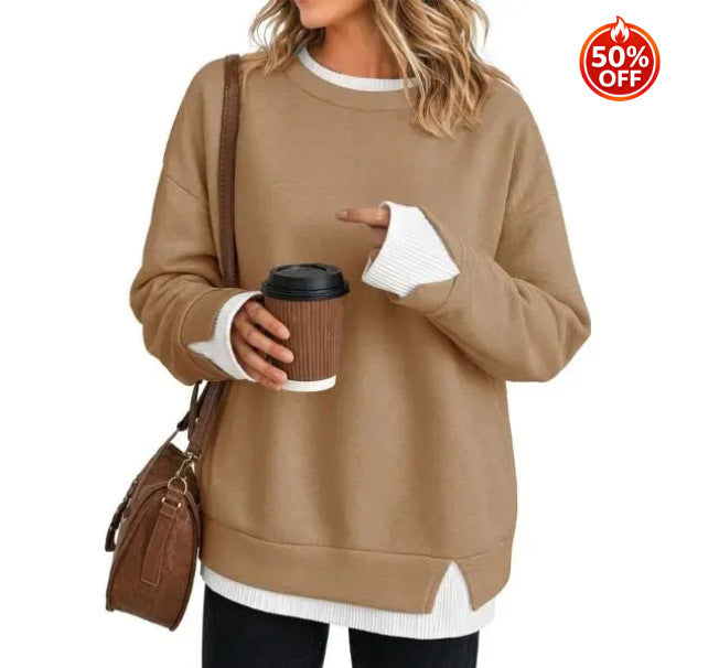 Relaxed pink crewneck sweatshirt with long sleeves and a ribbed collar