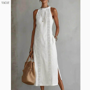 White sleeveless midi dress with mock neck and vertical lace trim panels, front view