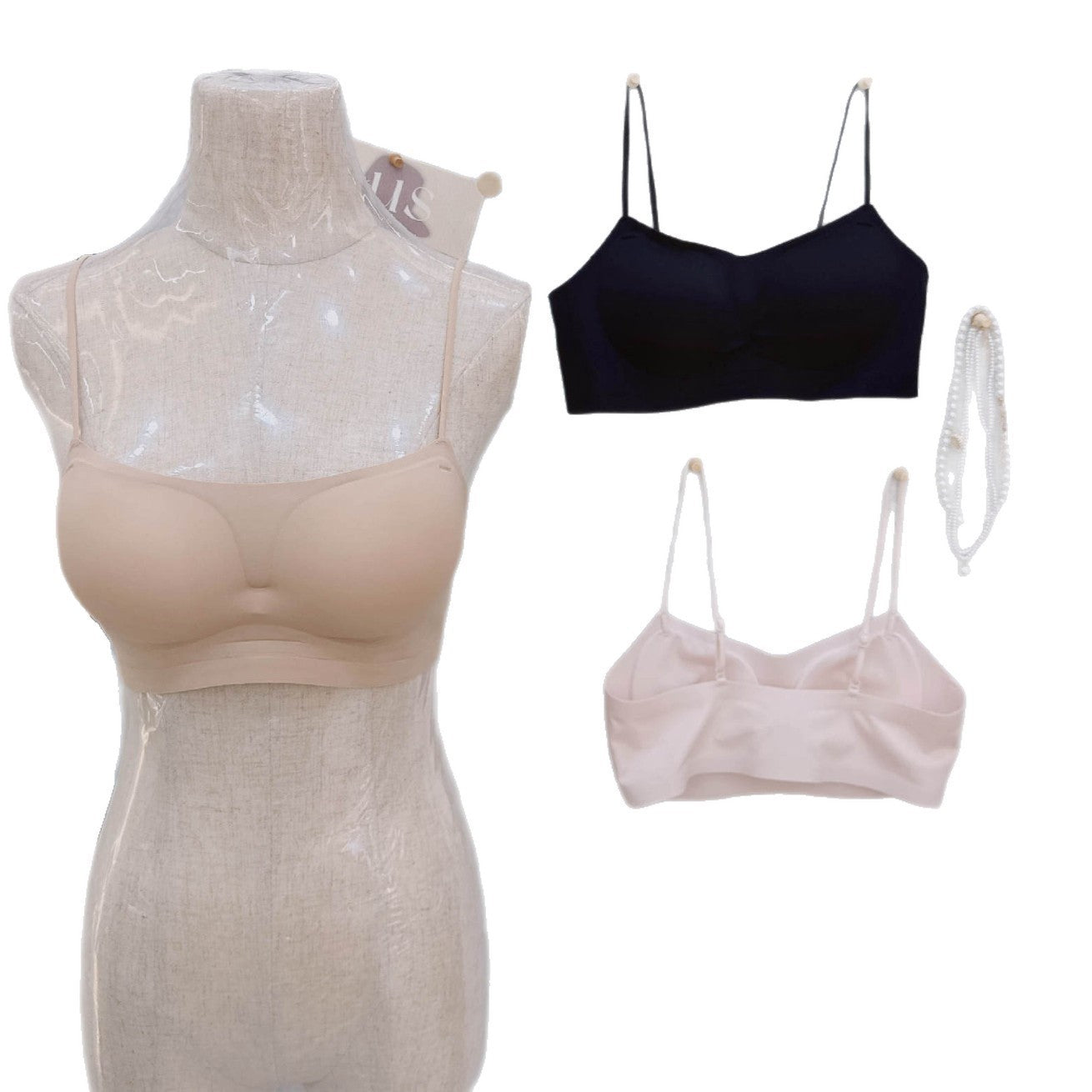 Seamless push up bralette laid flat to show the wide smooth underband and vest style