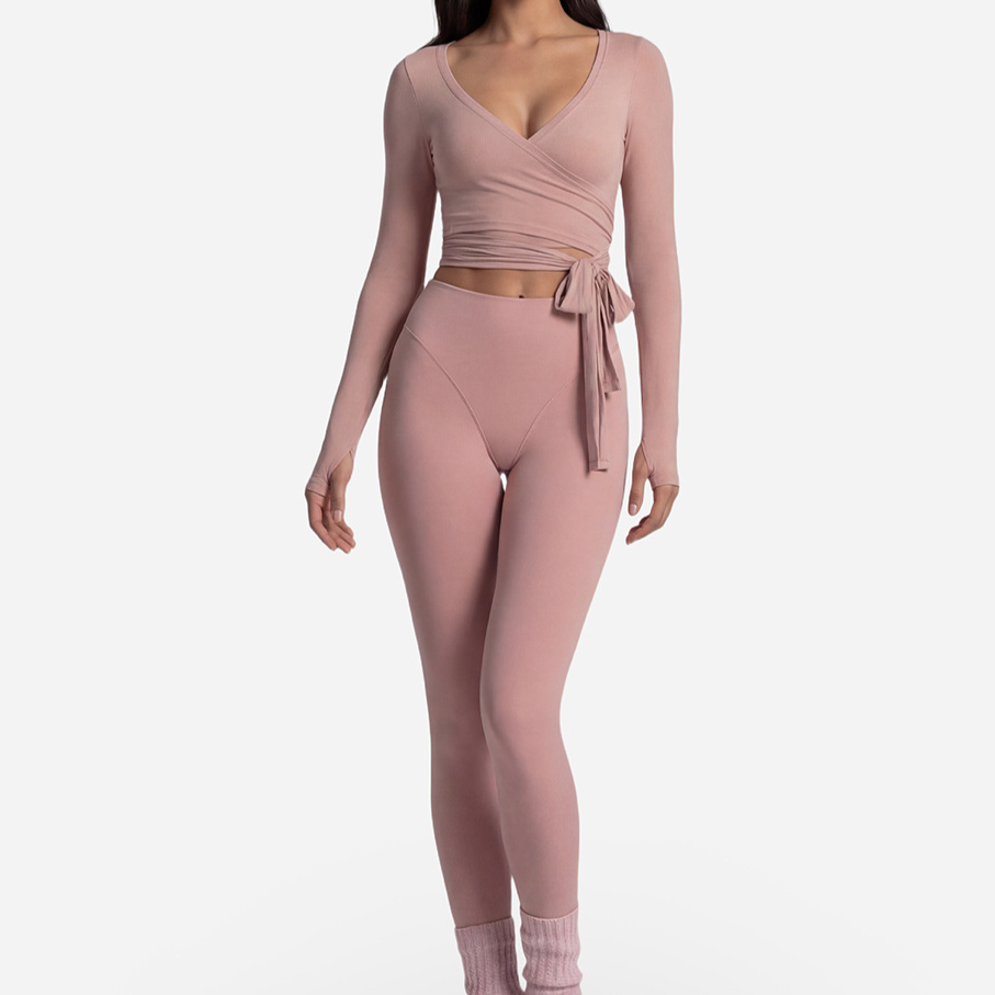 Ballet wrap skirt tied over full length leggings in the yoga set