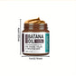 Hand holding the 120g MBOAH Batana oil jar to show its compact scale
