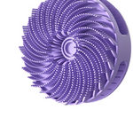 Purple silicone scalp shampoo brush with swirling cyclone bristles seen from the front