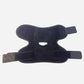 Black polyester ankle wrap laid flat on a grey background with hook and loop tabs