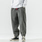 Grey plush harem pants with drawstring waist and tapered ankle cuffs, size 2XL option photo