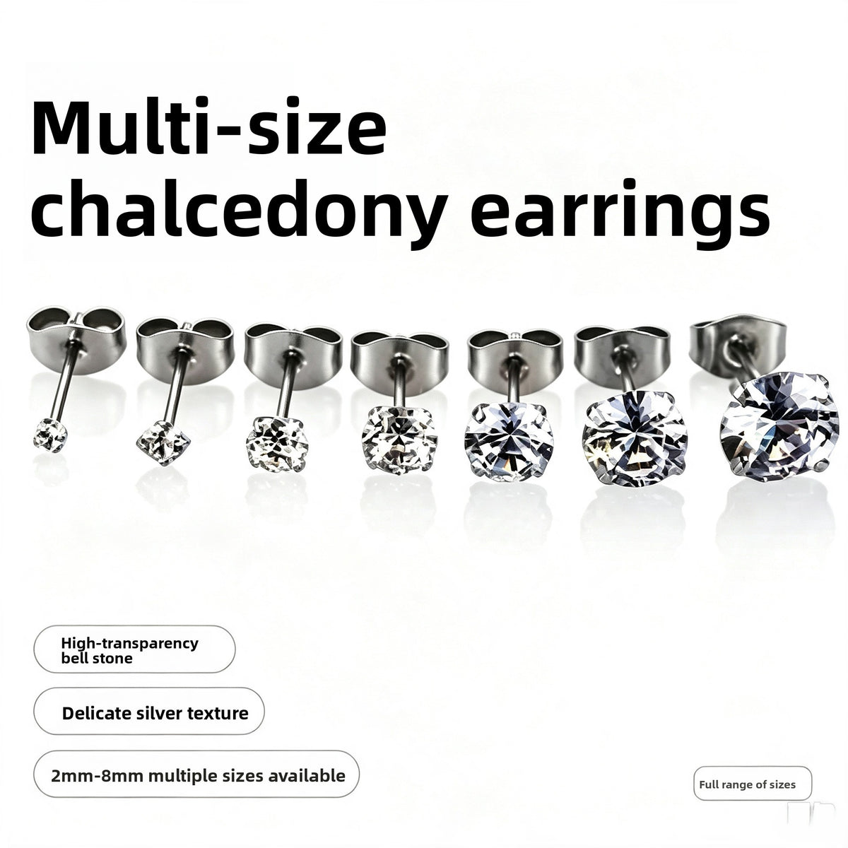 Row of seven cubic zirconia stainless steel studs from 2mm up to a large stone