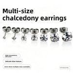Row of seven cubic zirconia stainless steel studs from 2mm up to a large stone