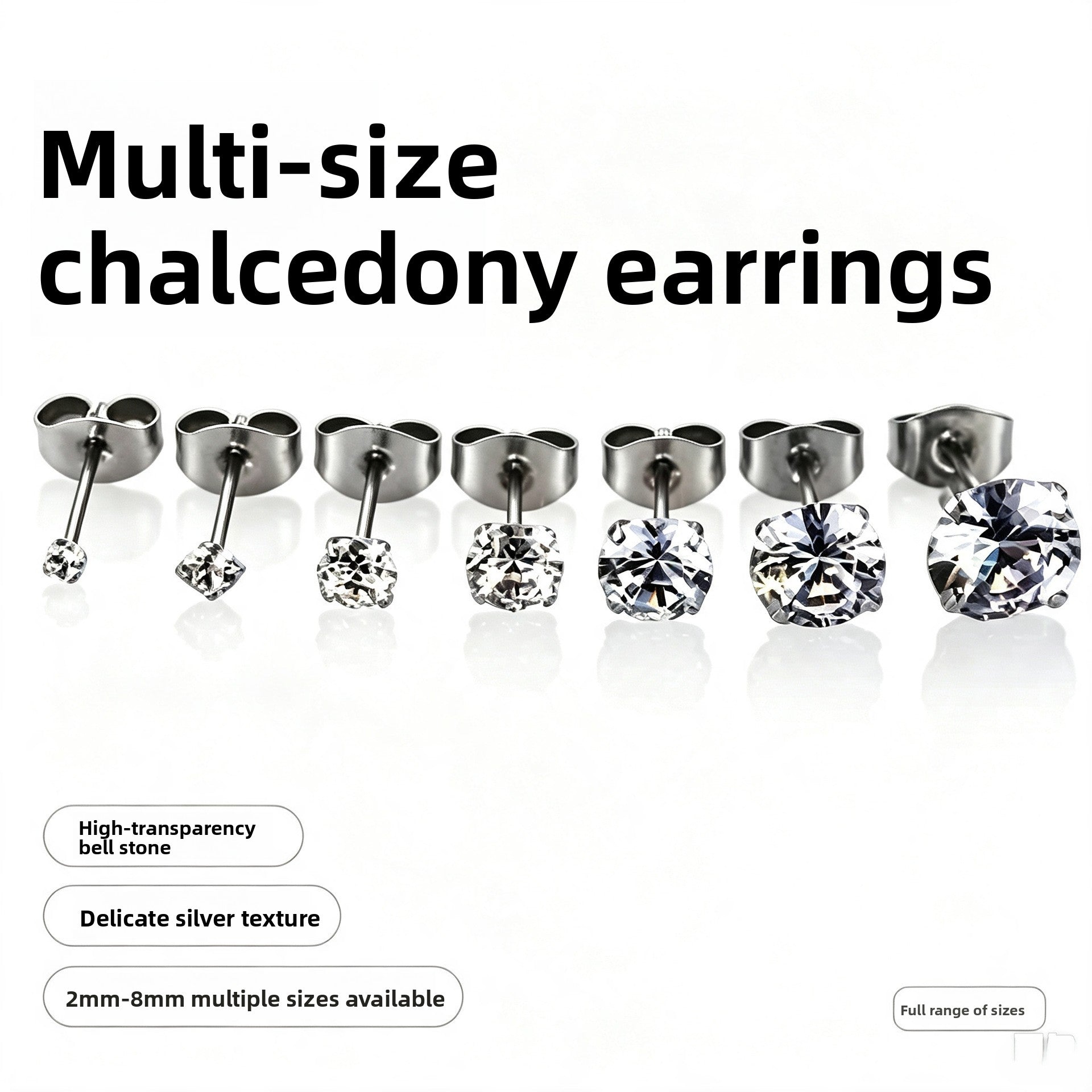 Row of seven cubic zirconia stainless steel studs from 2mm up to a large stone