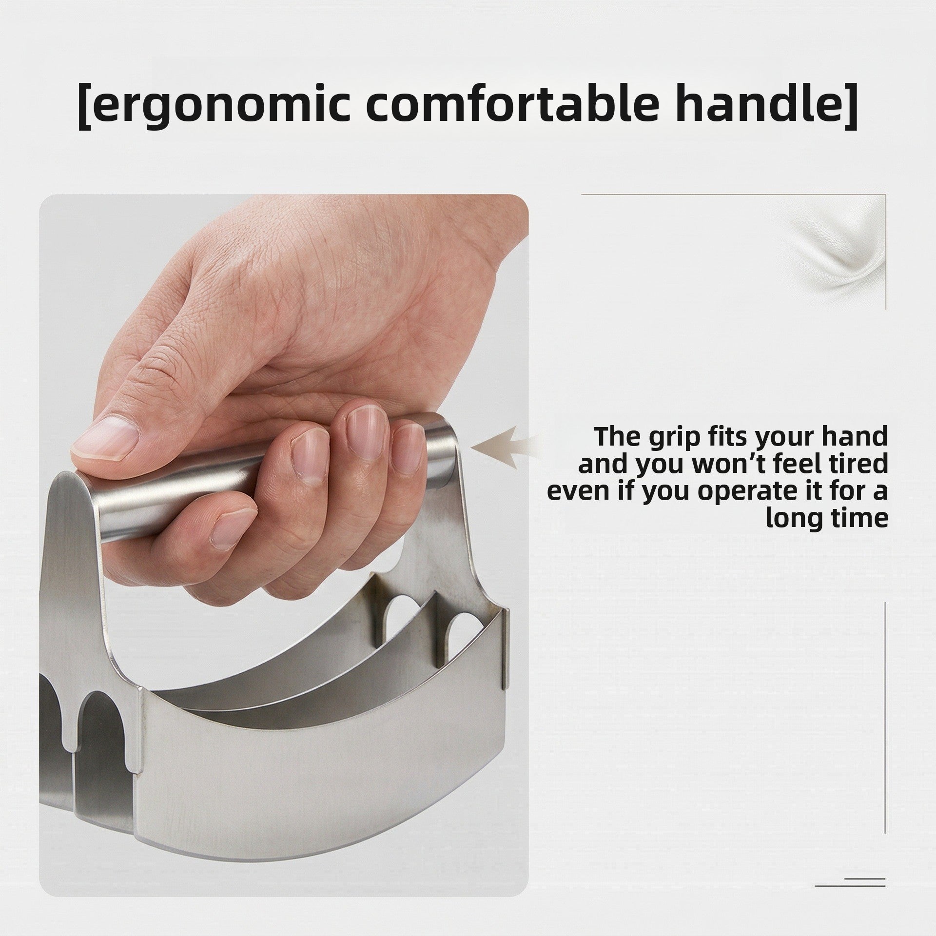 Close view of a hand holding the rolled top grip of the stainless steel cutter