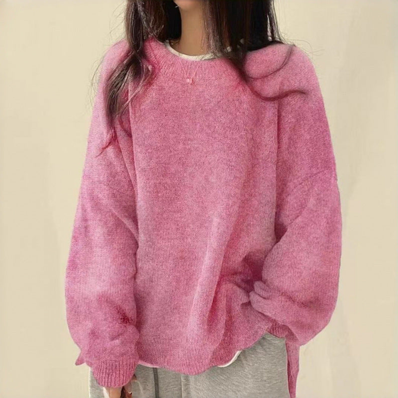 Loose knitted sweater with round neck and long puff sleeves