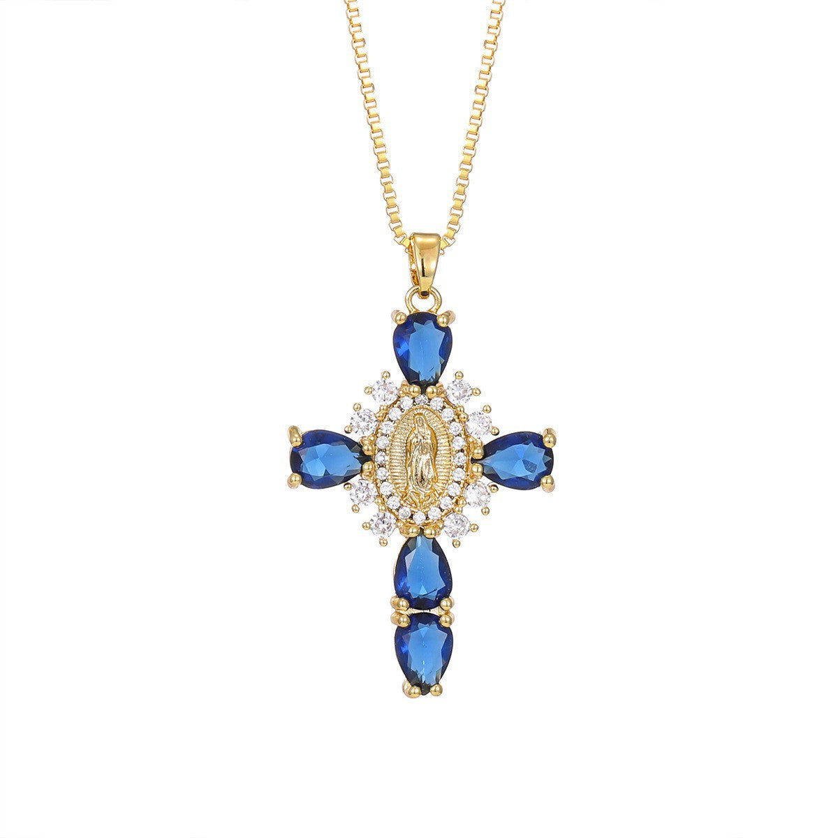 Cross pendant set with red cubic zirconia stones, close up on the paved arms