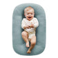 Lightweight baby lounger nest shown ready to lift and carry between rooms