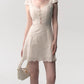 Angled view of the lace patchwork summer dress showing the light woven body and lace inserts