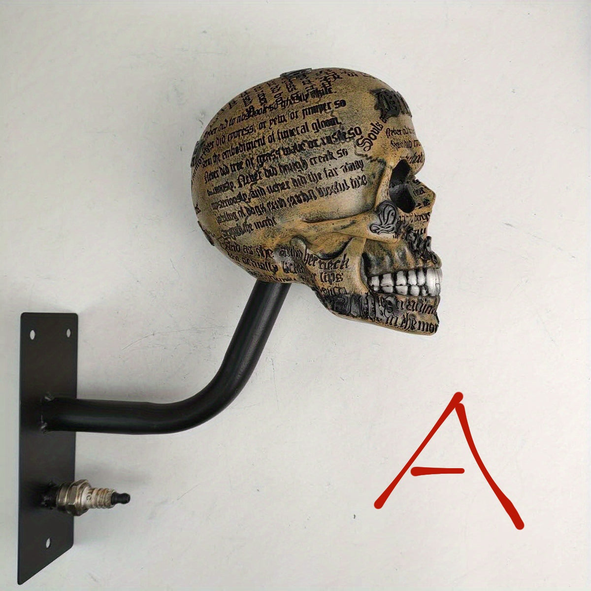 Painted resin skull finish on a metal wall rack for hanging a motorcycle helmet
