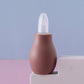 Six pastel manual baby nasal aspirator squeeze bulbs lined up with their soft rounded tips