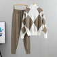 Khaki argyle knit sweater and jogger pants set with white panels on a hanger, size XXL option