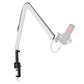White aluminum alloy microphone boom arm angled over a desk with a ghost mic outline for scale