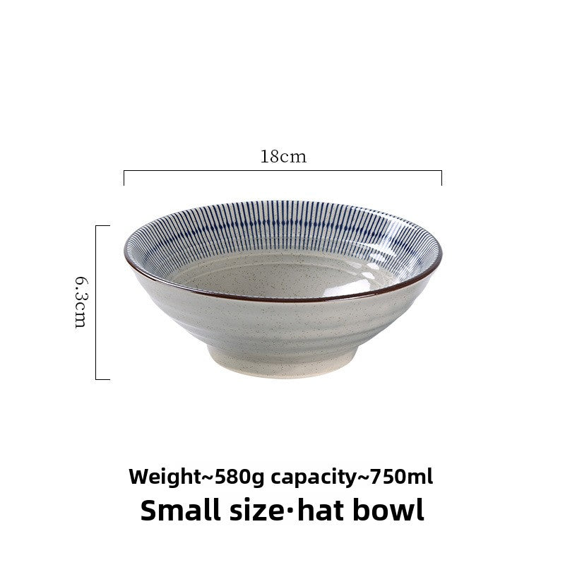 Top down view of the noodle bowl showing the tokusa stripe rim and wide mouth