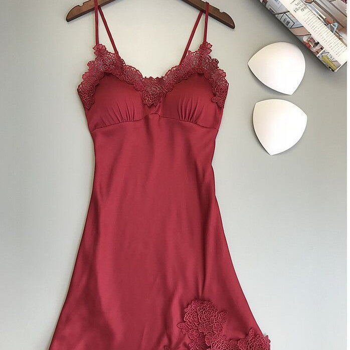 Ice silk lace cami nightgown in date red on a hanger with removable triangle bust pads beside it, front flat lay