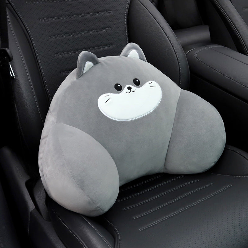 Gray cat lumbar support pillow with a white muzzle resting on a black car seat