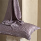 Heart design jacquard silk pillowcase in mauve with silk draped over it, pair option