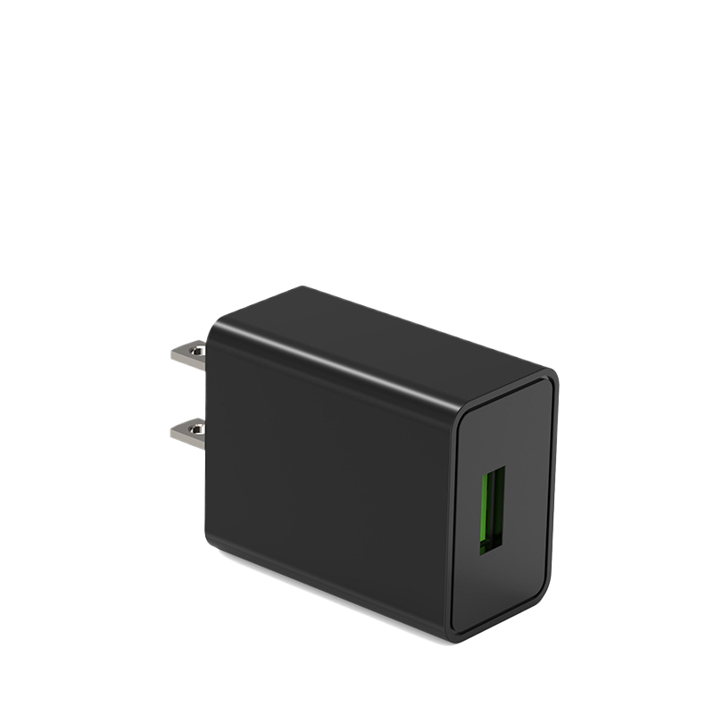 10W USB wall charger plugged into a wall socket in use