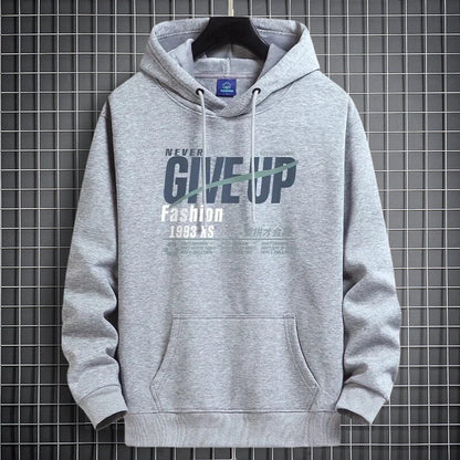 Light gray fleece-lined hooded sweatshirt on a hanger with a NEVER GIVE UP print and a front pocket