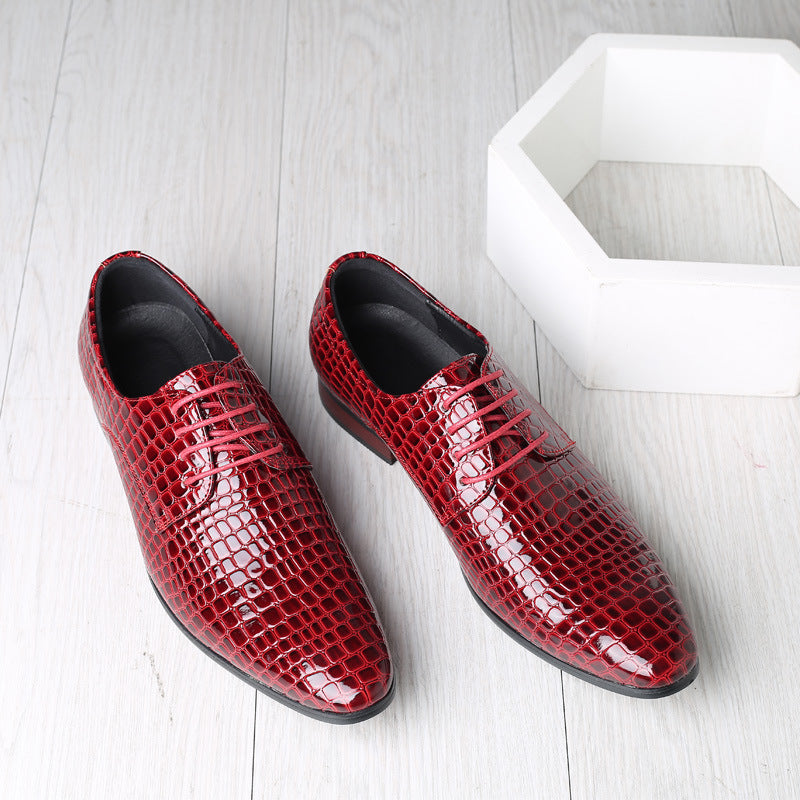 Red croc embossed PU derby shoe with pointed toe and low heel, pair from above on a pale floor, EU 39 option