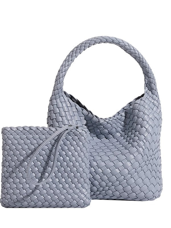 Front view of grey plaited PU leather bucket bag showing the basket weave lattice and open top