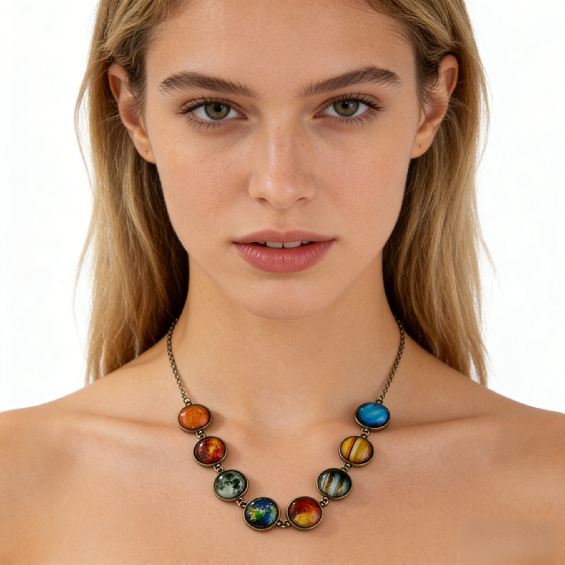 Woman wearing the antique bronze tone solar system necklace, eight cabochons sitting along the collarbone