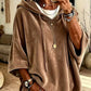 Womens loose hooded top with a dropped shoulder line and mid length hem