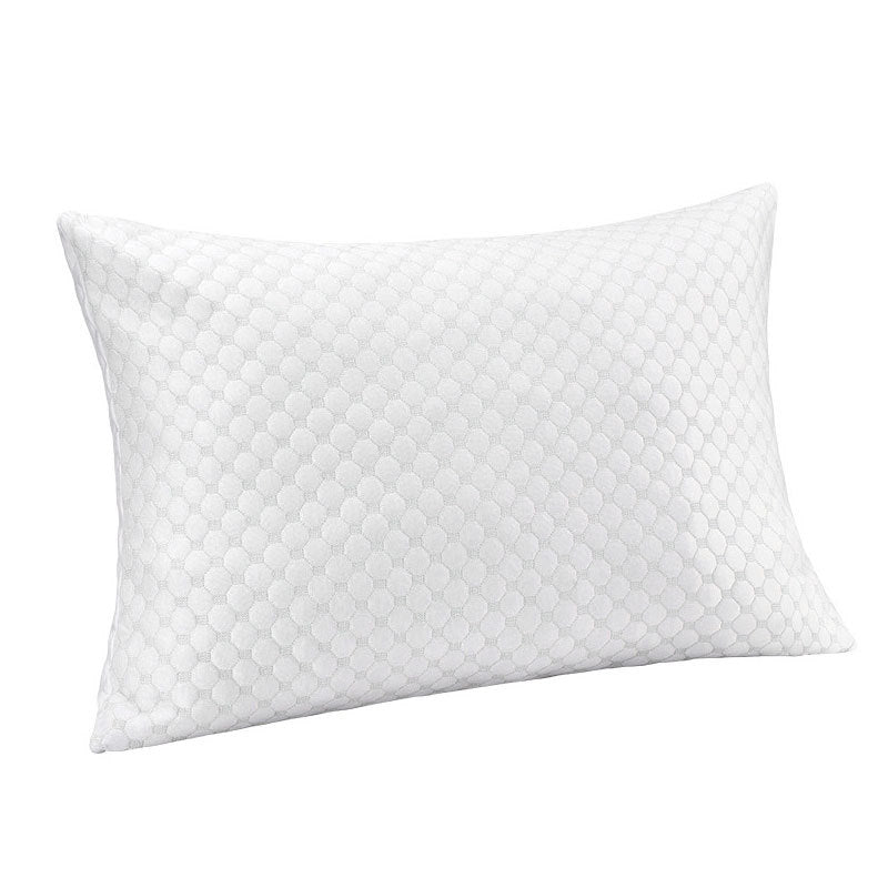 Rectangular memory foam bed pillow with a quilted cooling knit cover three quarter view on a bed