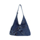 Slouchy denim and canvas shoulder bag styled from jeans with pockets and rivets