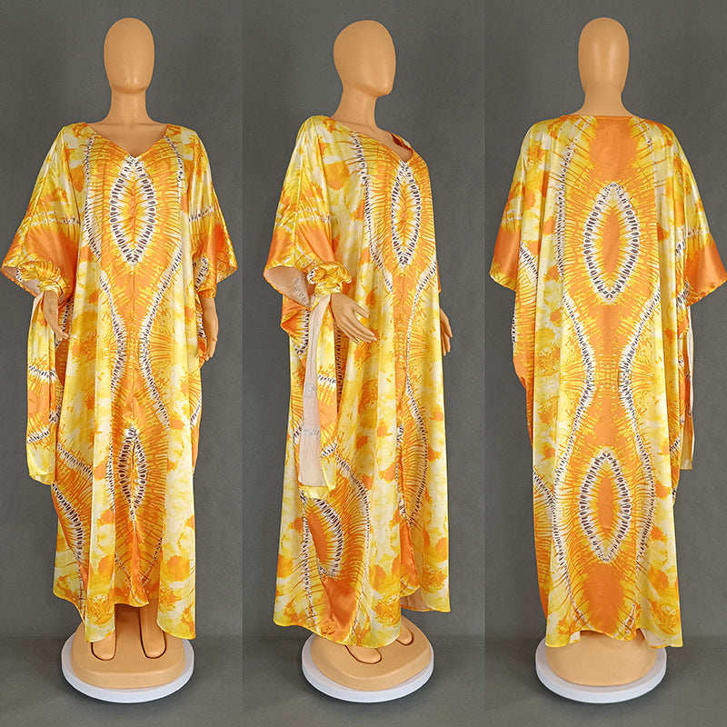 Tie dye satin finish kaftan maxi dress draping loosely over the body, front view