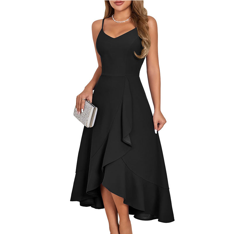 Spaghetti strap ruffled cocktail dress worn at an evening dinner, full length view