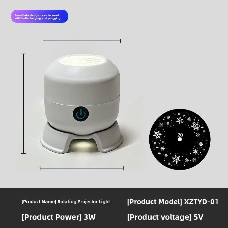 Rotating projector light with power button and a snowflake pattern disc, rechargeable model that can also be plugged in