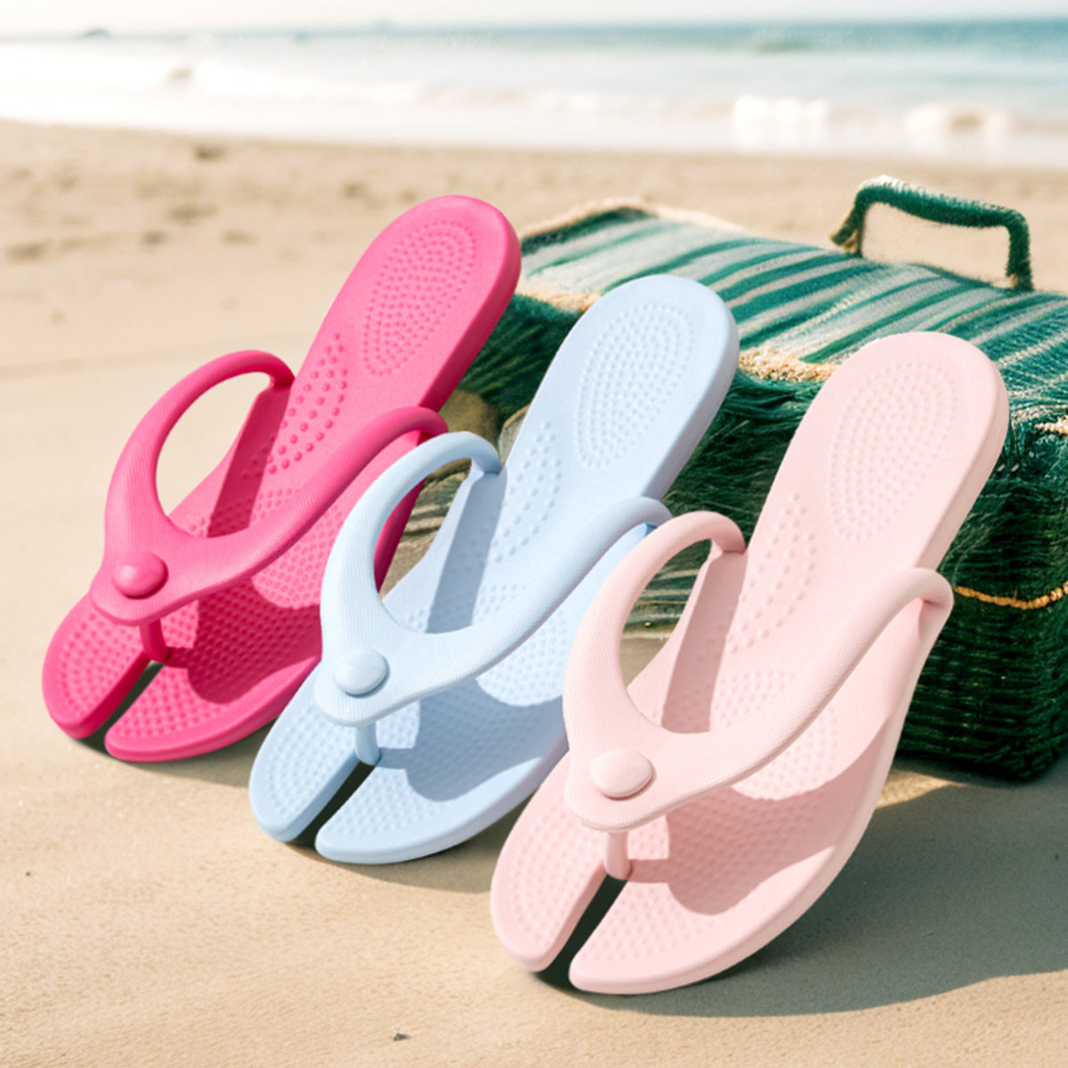 Foldable EVA thong travel slipper with a single moulded strap and a round closing stud