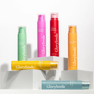GlorySmile fruity fluoride toothpaste tubes in six colors including pink, red, green and orange