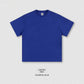 Close view of the thick 305g cotton knit and ribbed crew neckline on the oversized tee